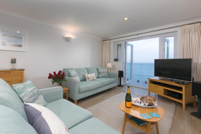 Wavetop is in Carbis Bay, Cornwall. Penthouse apartment with stunning sea views. Near beach. Stylish