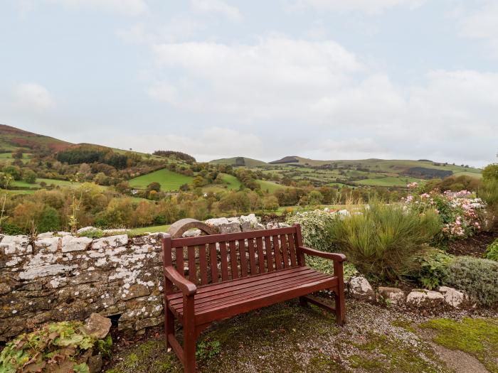 The Barn in Llanarmon-Yn-Ial, North Wales with indoor heated pool, valley view and woodburning stove