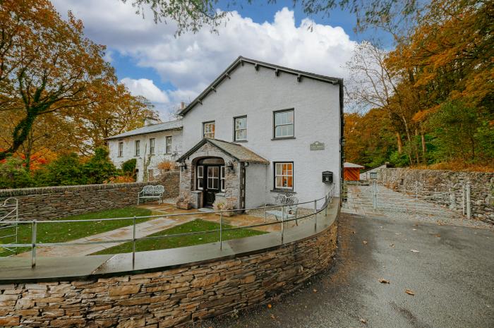 Gate House, is in Coniston, Cumbria. Four-bedroom home with stunning riverside views. Hot tub. Pets.