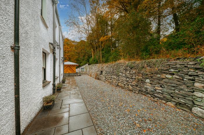 Gate House, is in Coniston, Cumbria. Four-bedroom home with stunning riverside views. Hot tub. Pets.