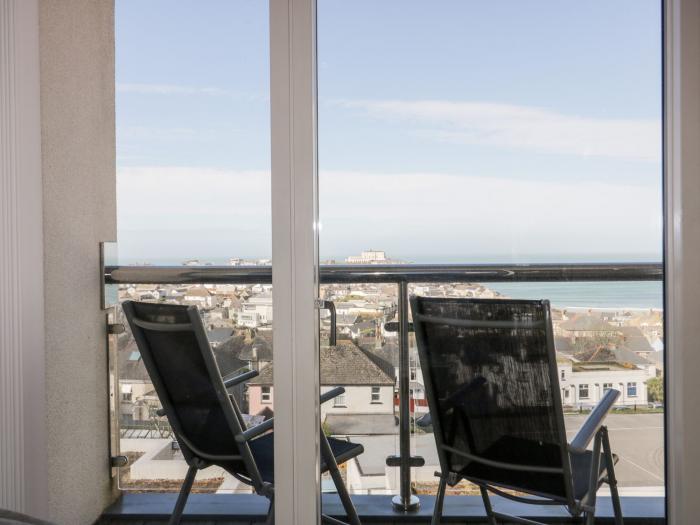 10 Quay Court in Newquay, Cornwall. Four-bedroom townhouse with sea views. Pets. Near beach. Stylish