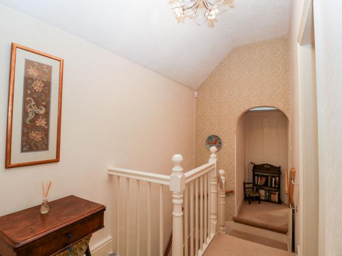 2 Heath Cottages, Sandford, Dorset. Woodburning stove. Off-road parking. Pet-friendly. Front garden.