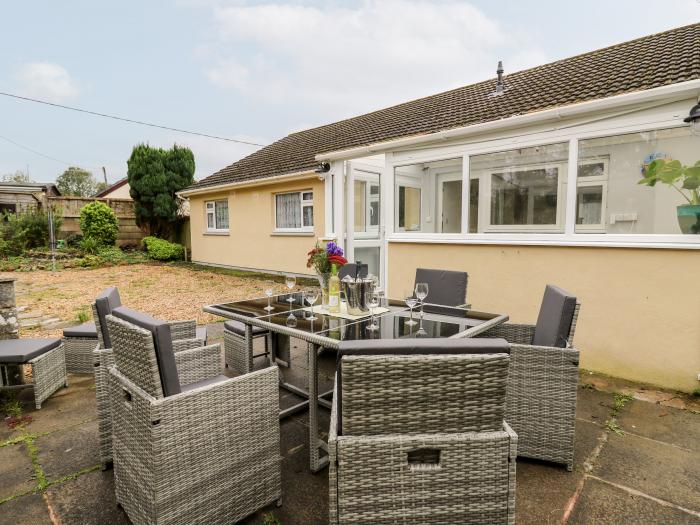 Melrose, in Kilgetty, Pembrokeshire. Four-bedroom home near amenities and attractions. Pet-friendly.