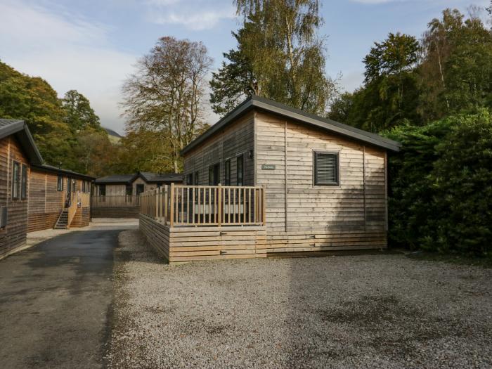 The Bothy is in Keswick, in Cumbria. Single-storey lodge with rural views. In national park. Family.