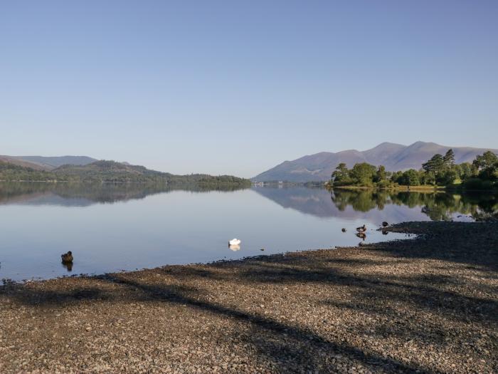 The Bothy is in Keswick, in Cumbria. Single-storey lodge with rural views. In national park. Family.