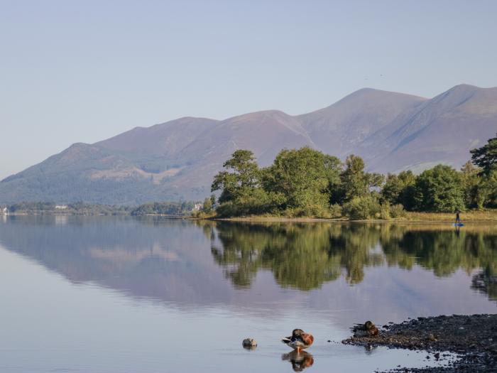 The Bothy is in Keswick, in Cumbria. Single-storey lodge with rural views. In national park. Family.