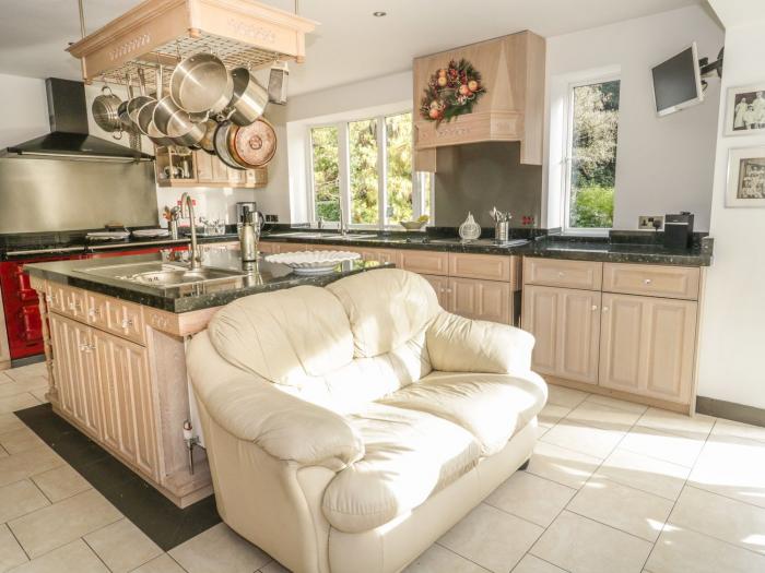 Branksome Wood House in Poole, Dorset. Close to amenities. Indoor swimming pool. Hot tub. Woodburner