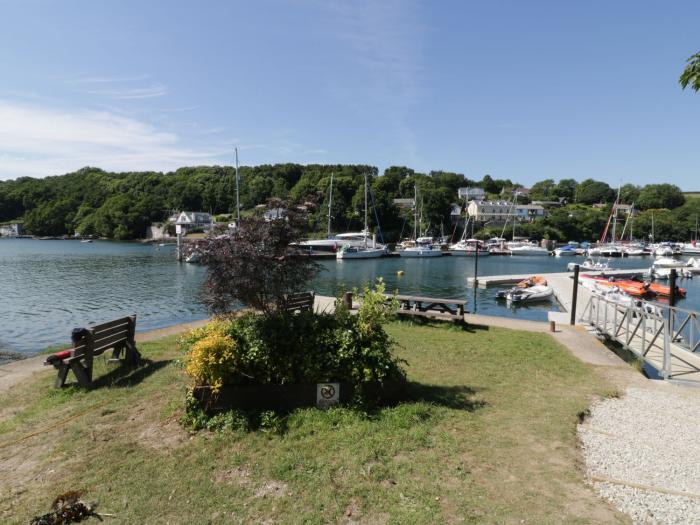 Penmarlam Quay Cottage is in Fowey, Cornwall. Close to amenities and a beach. Off-road parking. Dogs