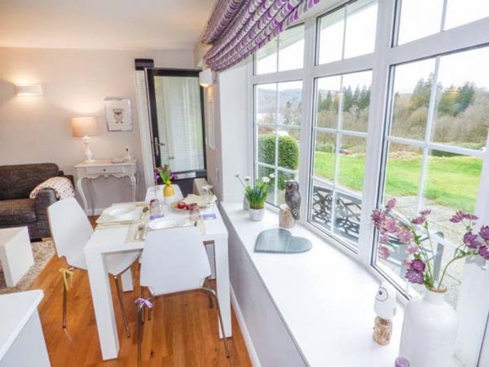 T'whit T'woo in Windermere, Cumbria. Two-bedroom bungalow in Lake District National Park. Near shops