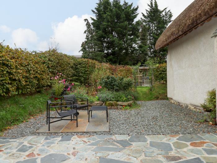 The Acorn Barn in Hittisleigh, Devon. Thatched cottage. Set in beautiful grounds. Romantic dwelling.