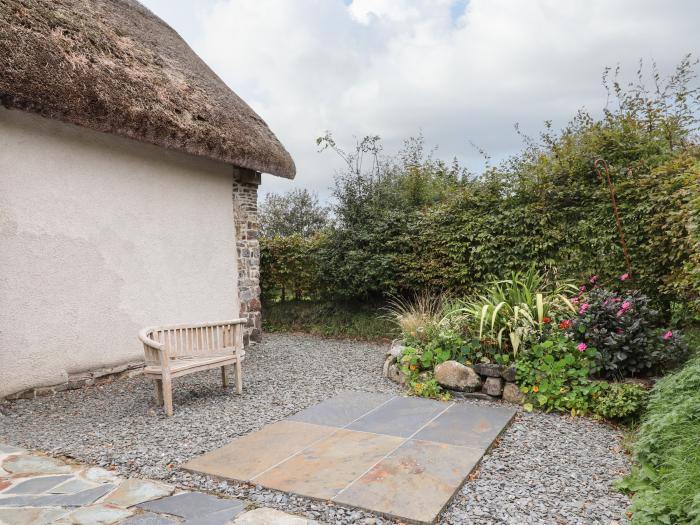 The Acorn Barn in Hittisleigh, Devon. Thatched cottage. Set in beautiful grounds. Romantic dwelling.