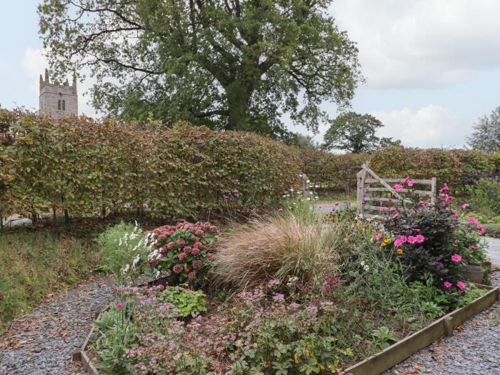 The Acorn Barn in Hittisleigh, Devon. Thatched cottage. Set in beautiful grounds. Romantic dwelling.