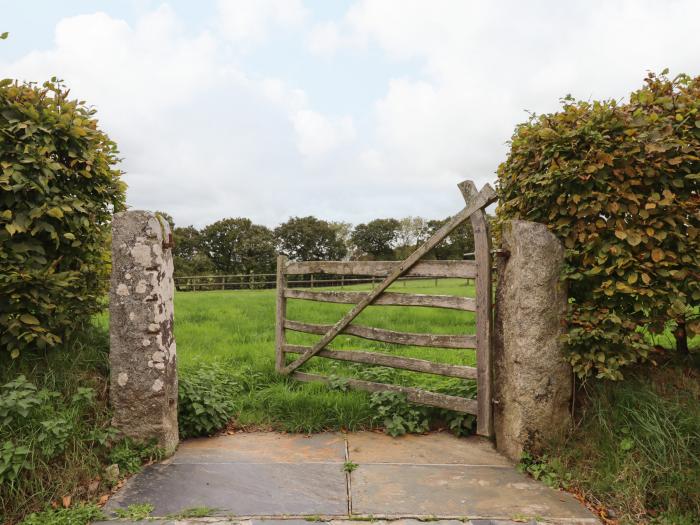 The Acorn Barn in Hittisleigh, Devon. Thatched cottage. Set in beautiful grounds. Romantic dwelling.