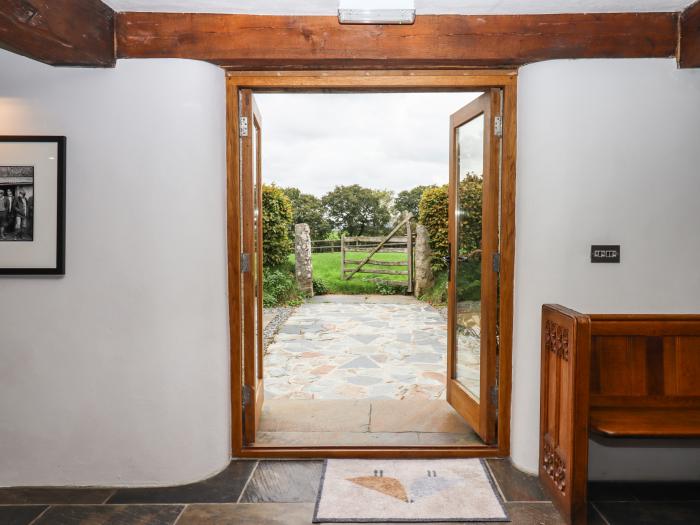 The Acorn Barn in Hittisleigh, Devon. Thatched cottage. Set in beautiful grounds. Romantic dwelling.