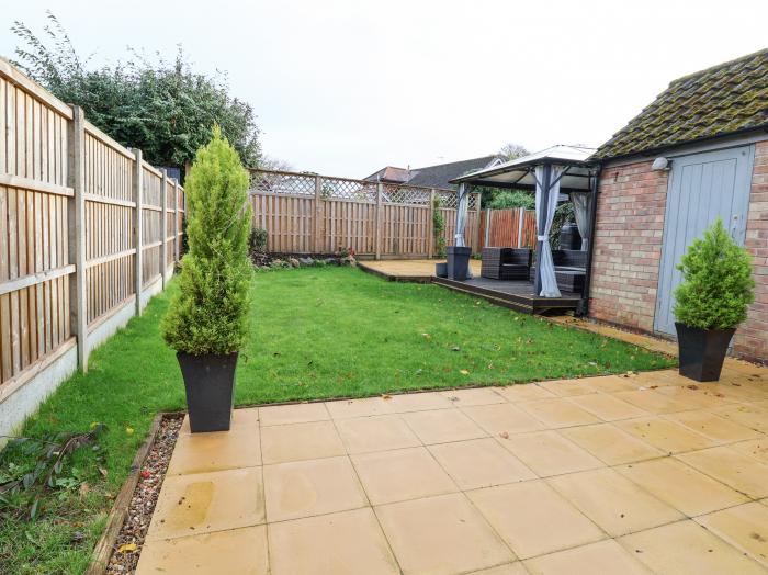 Rainbows End, in Christleton, Cheshire. Three-bedroom home near amenities. Stylish. Enclosed garden.