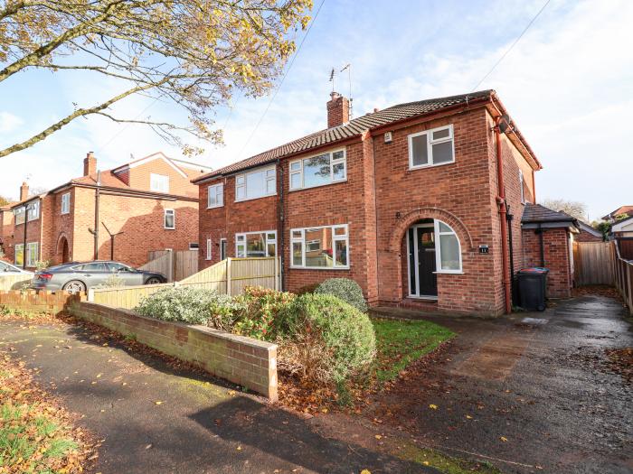 Rainbows End, in Christleton, Cheshire. Three-bedroom home near amenities. Stylish. Enclosed garden.