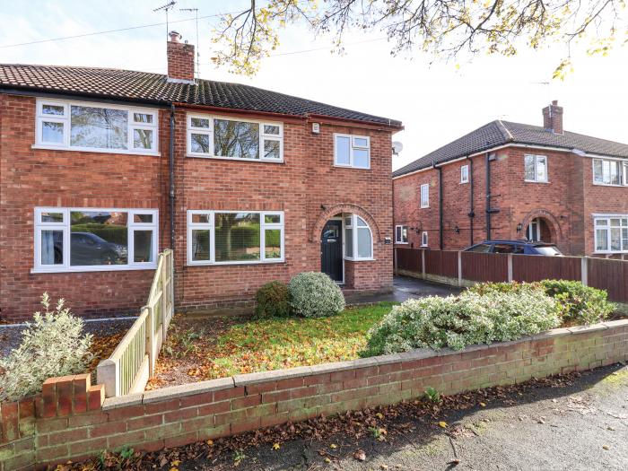 Rainbows End, in Christleton, Cheshire. Three-bedroom home near amenities. Stylish. Enclosed garden.