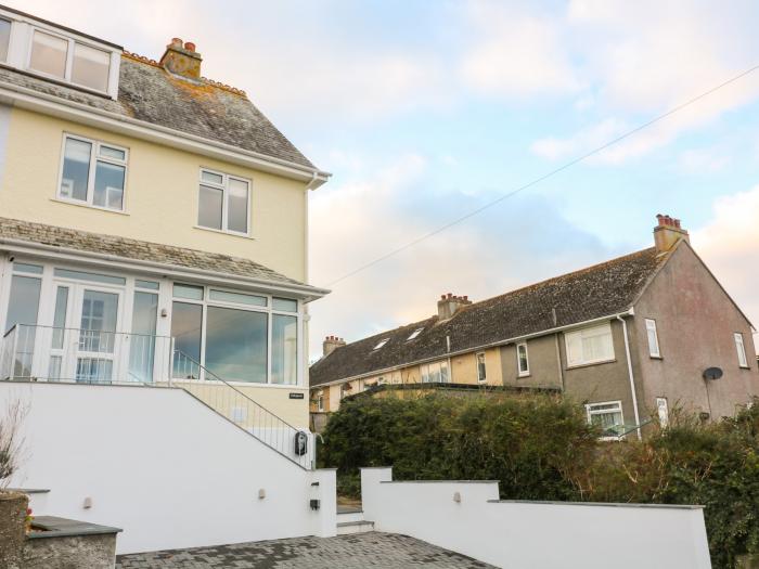 Salvatore, rests in Salcombe, Devon. Five-bedroom home with sea views. Close to amenities and beach.