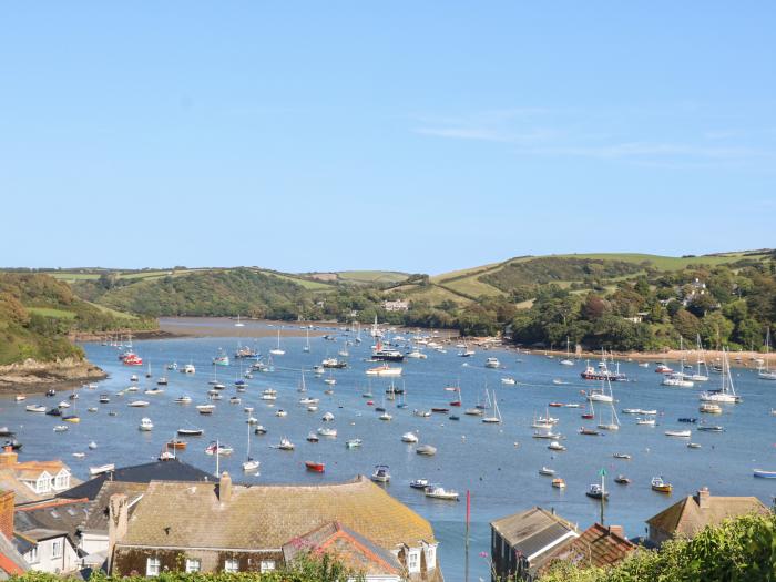 Salvatore, rests in Salcombe, Devon. Five-bedroom home with sea views. Close to amenities and beach.