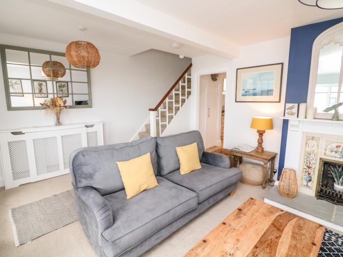 Salvatore, rests in Salcombe, Devon. Five-bedroom home with sea views. Close to amenities and beach.