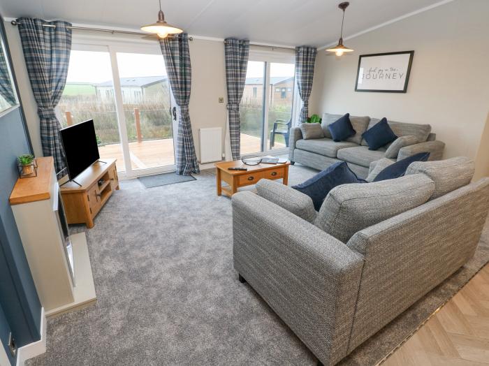 Skomer Lodge nr Broad Haven, Pembrokeshire. Single-storey lodge with uninterrupted countryside views