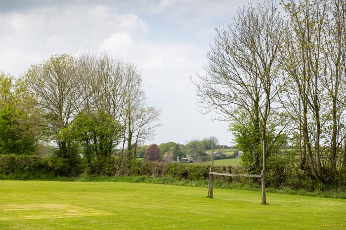 Tarka's Holt Log Cabin, Torrington, Devon. Set on a spacious parkland with on-site facilities. WiFi.