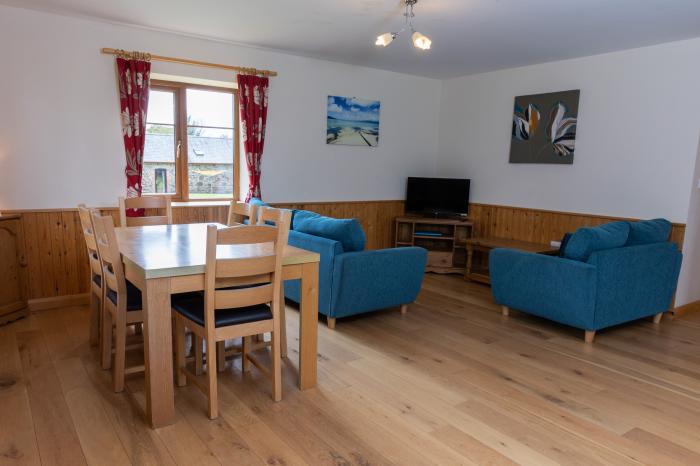 Tarka's Holt Log Cabin, Torrington, Devon. Set on a spacious parkland with on-site facilities. WiFi.