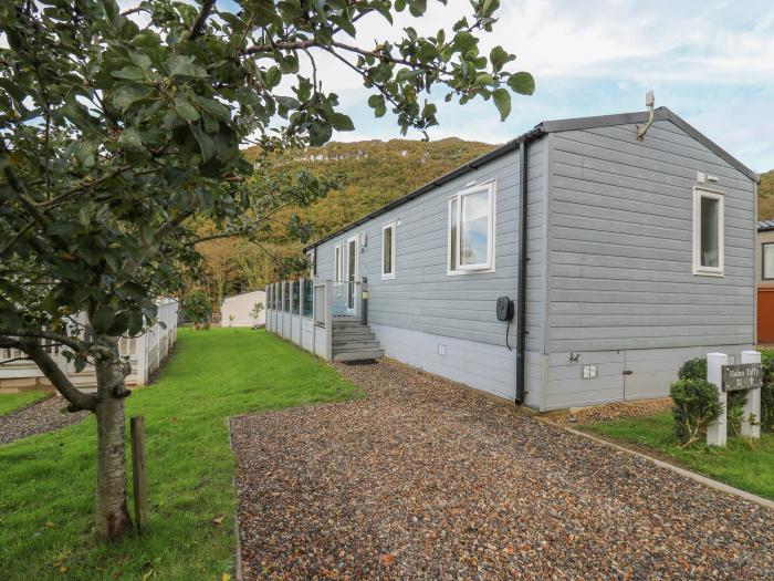 Hafan Taffy (Number 32), near Llanarth, Ceredigion. Pet-friendly lodge near the beach and amenities.