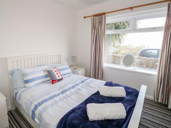 Waverley, Mevagissey, Cornwall. Dog-friendly, coastal bungalow near amenities, with a private garden