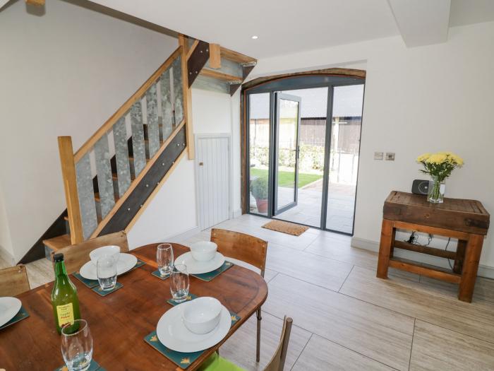 Plough Share, Huntley, Gloucestershire. Barn conversion. Contemporary. Wood-fired hot tub. Two pets.