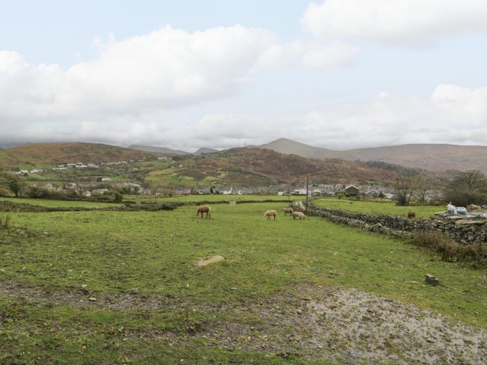 Ty Den, Deiniolen, Gwynedd. Detached barn conversion in a rural setting. Off-road parking. Smart TV.