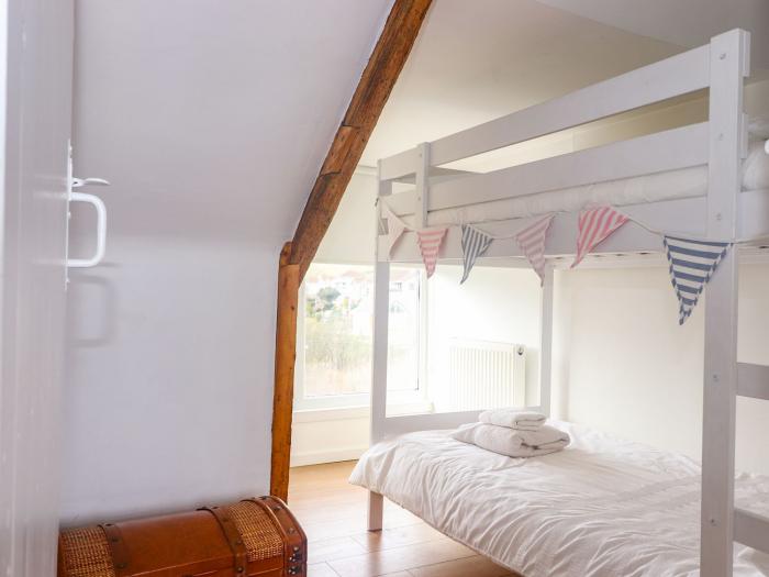 The Loft at Beach House, is in Portmellon near Mevagissey, Cornwall. Close to amenities and a beach.