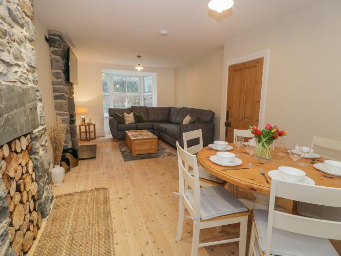 Hendre Cottage in Llwyngwril, Gwynedd. Semi-detached. Pet free. Woodburning stove. Walking location.