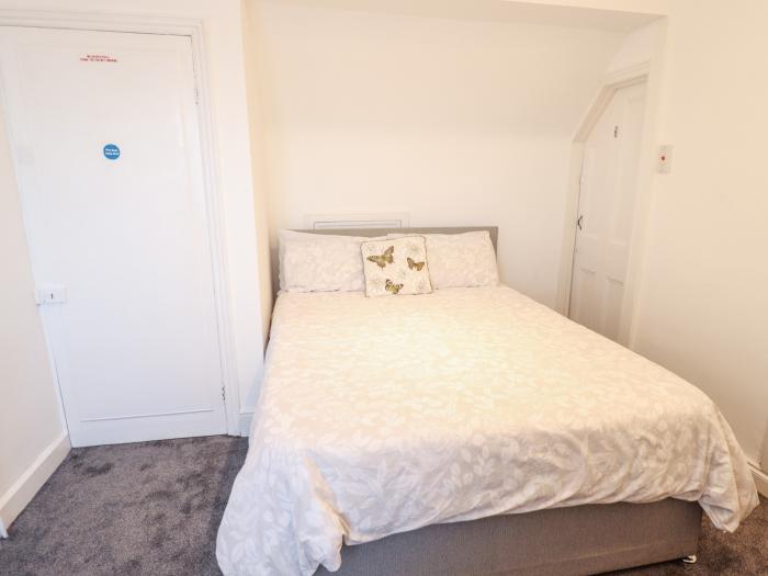 Caxton House, thirteen-bedroom holiday home in Skegness town centre, Lincolnshire. Off-road parking.