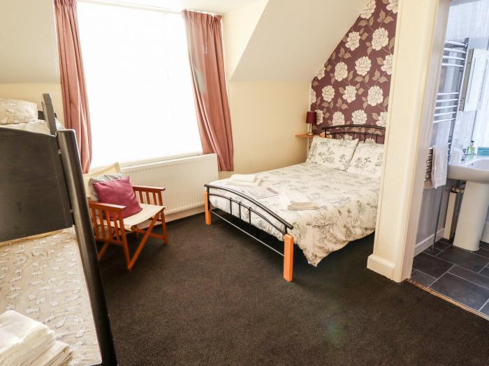 Caxton House, thirteen-bedroom holiday home in Skegness town centre, Lincolnshire. Off-road parking.