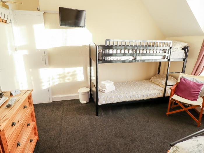 Caxton House, thirteen-bedroom holiday home in Skegness town centre, Lincolnshire. Off-road parking.