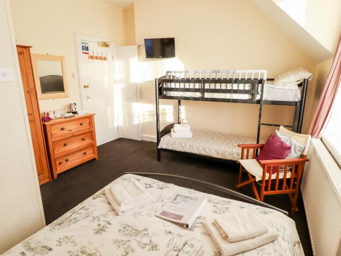 Caxton House, thirteen-bedroom holiday home in Skegness town centre, Lincolnshire. Off-road parking.