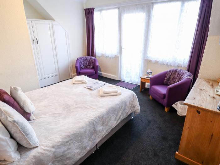 Caxton House, thirteen-bedroom holiday home in Skegness town centre, Lincolnshire. Off-road parking.