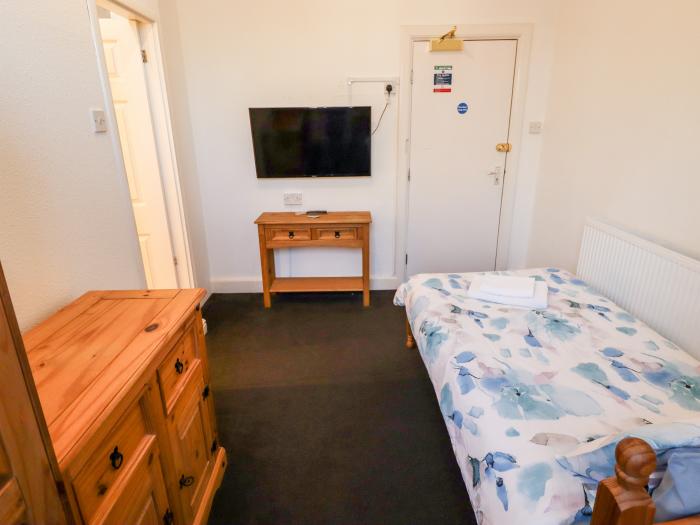 Caxton House, thirteen-bedroom holiday home in Skegness town centre, Lincolnshire. Off-road parking.