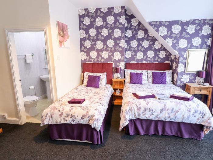 Caxton House, thirteen-bedroom holiday home in Skegness town centre, Lincolnshire. Off-road parking.