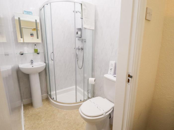 Caxton House, thirteen-bedroom holiday home in Skegness town centre, Lincolnshire. Off-road parking.