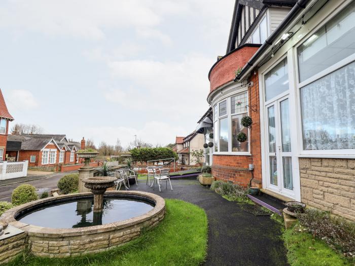 Caxton House, thirteen-bedroom holiday home in Skegness town centre, Lincolnshire. Off-road parking.