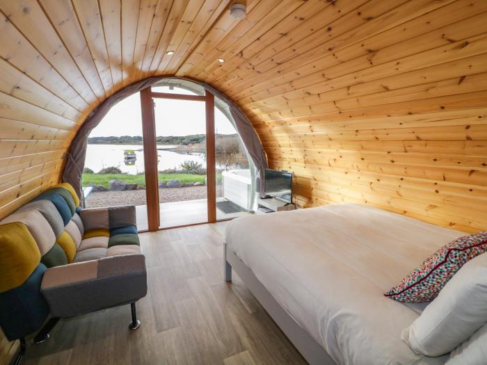 The Wheelhouse Pod No. 2, in Burtonport, County Donegal. Close to beach and shop. Hot tub. Romantic.