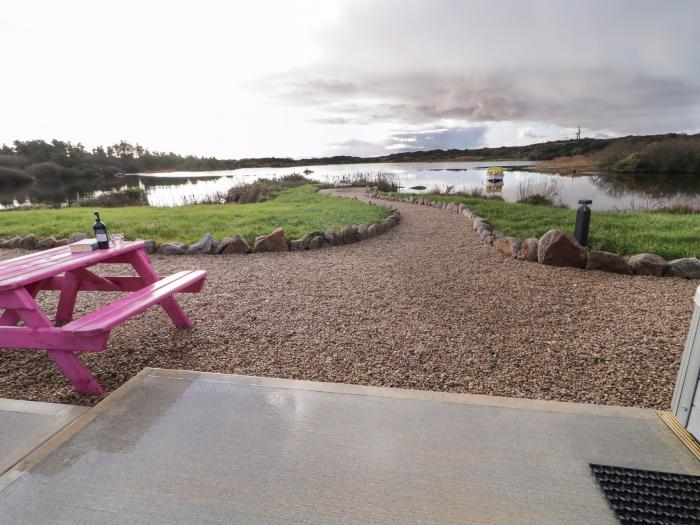 The Wheelhouse Pod No. 2, in Burtonport, County Donegal. Close to beach and shop. Hot tub. Romantic.