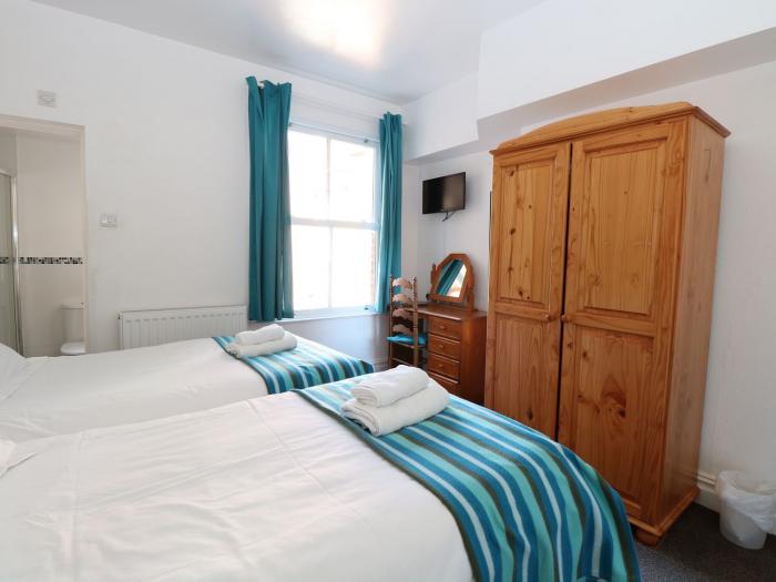 Birch House, a Victorian property in Cromer, Norfolk. Near the beach and amenities. Family-friendly.