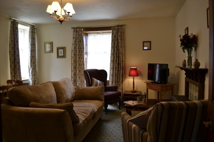 Rhododendron Apartment in Berrynarbor near Ilfracombe, Devon. Dog-friendly and with private parking.