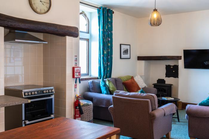 Clock Tower Apartment in Berrynarbor near Ilfracombe in Devon. Private parking. Pool on-site. Garden