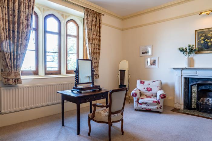 Clock Tower Apartment in Berrynarbor near Ilfracombe in Devon. Private parking. Pool on-site. Garden