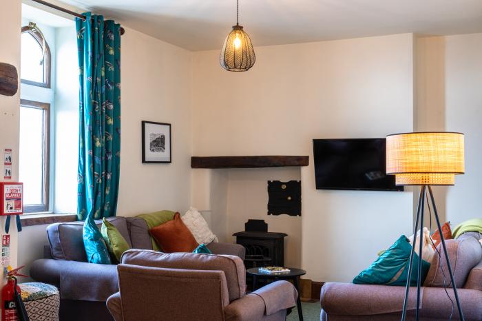 Clock Tower Apartment in Berrynarbor near Ilfracombe in Devon. Private parking. Pool on-site. Garden