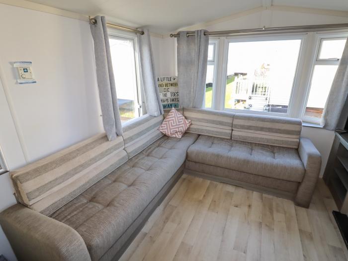 14 Fir Tree Close in Lyons Robin Hood Holiday Park near Rhyl, Denbighshire. A single-storey caravan.